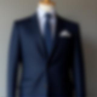 Navy blue tailored suit on display mannequin